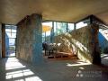 Granite Wall of Bartlit Residence by Lake Flato